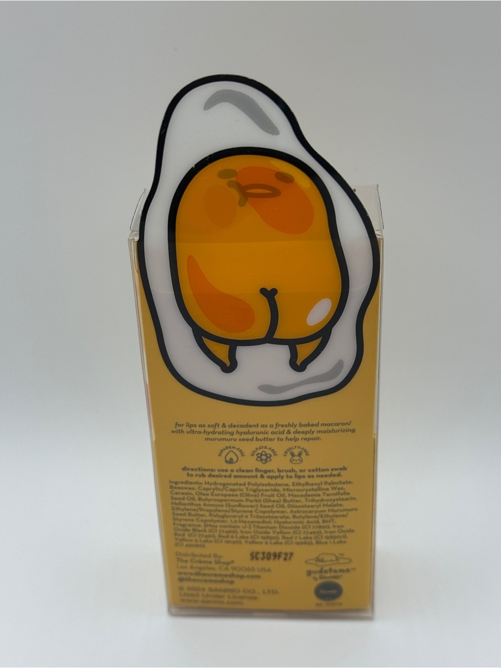 Limited Edition the Crème Shop x Gudetama Yellow Macaron Lip Balm - Picture 2 of 2